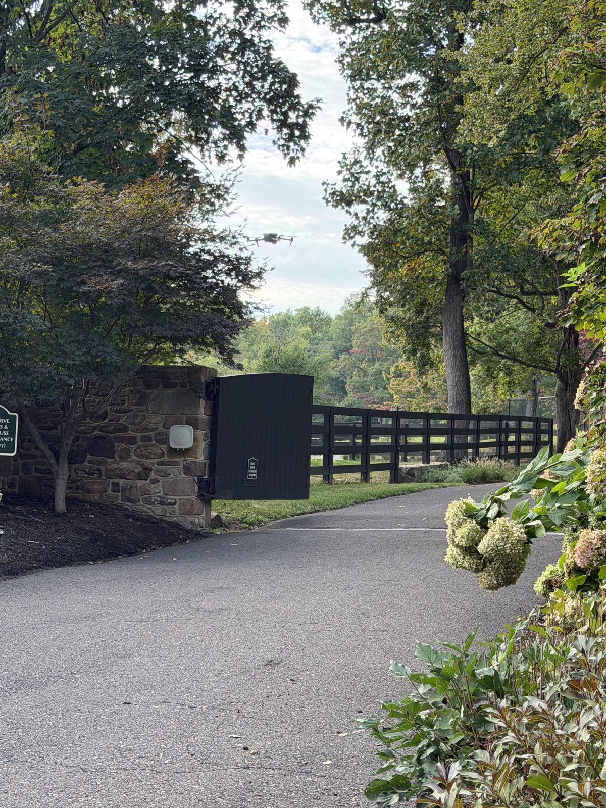 The stone-pillared private gate at the entrance to Carbon Ridge Farm